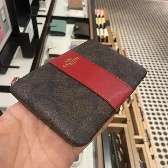 CORNER ZIP WRISTLET IN SIGNATURE CANVAS 58035 - Picture 9 of 9